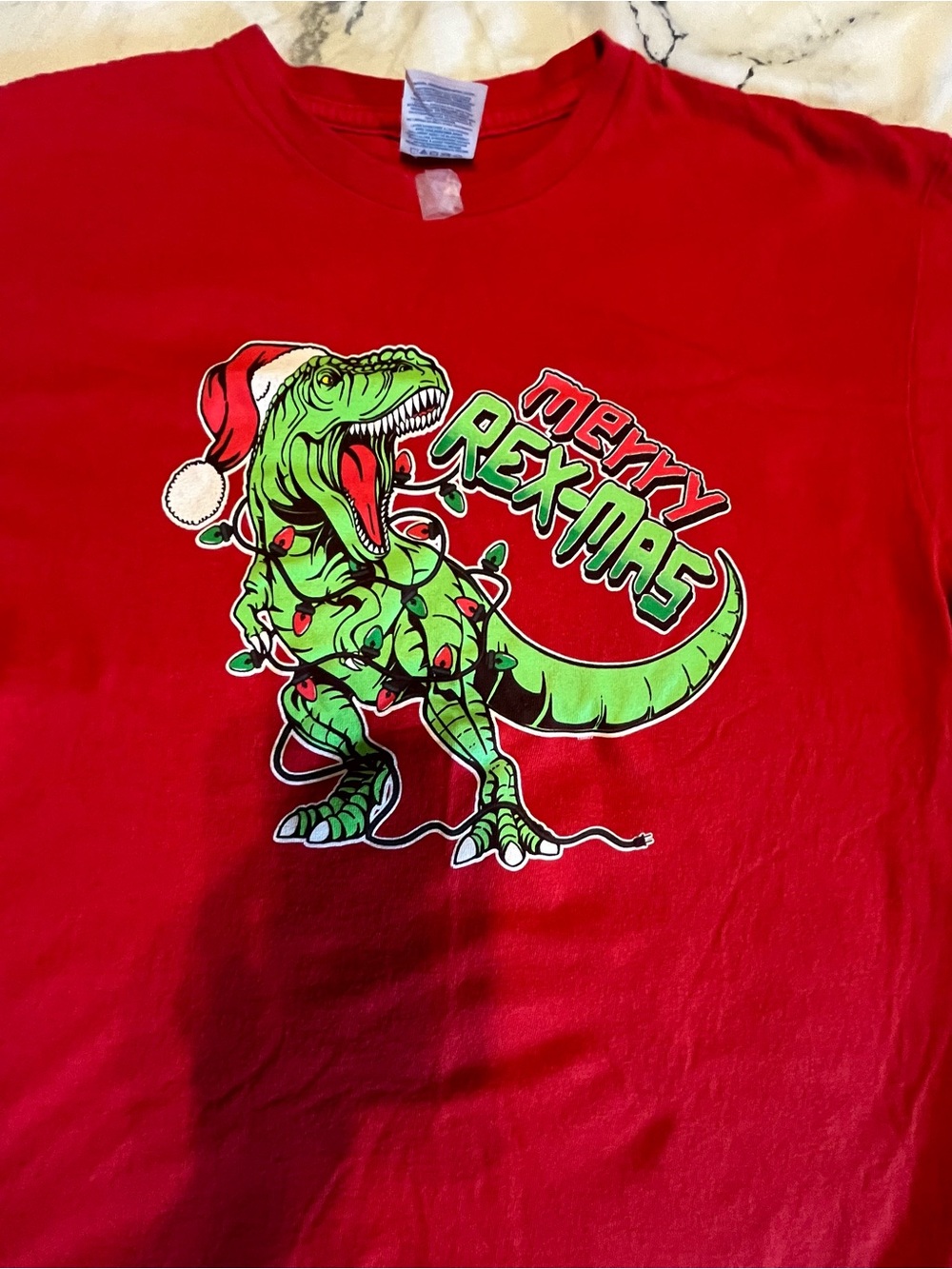 Delta Red Tee with Bright Green T-Rex Holiday Graphic